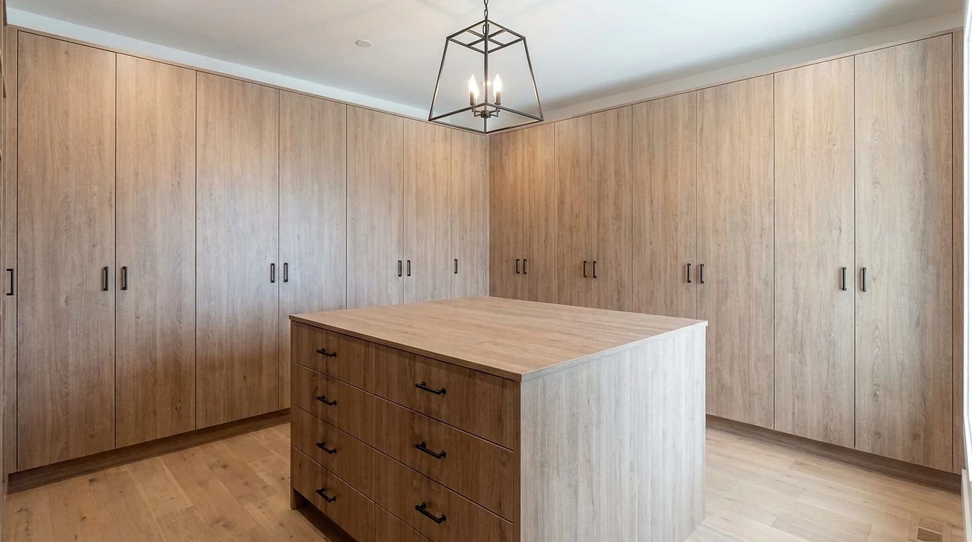 Closet Island as part of a full-wall custom closet run