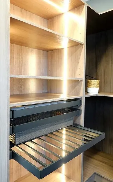 Pull out rattan basket with LED lit shelf above
