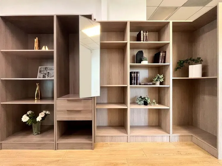 Assembled oak closet system with hanging rails, shelves and drawer bank